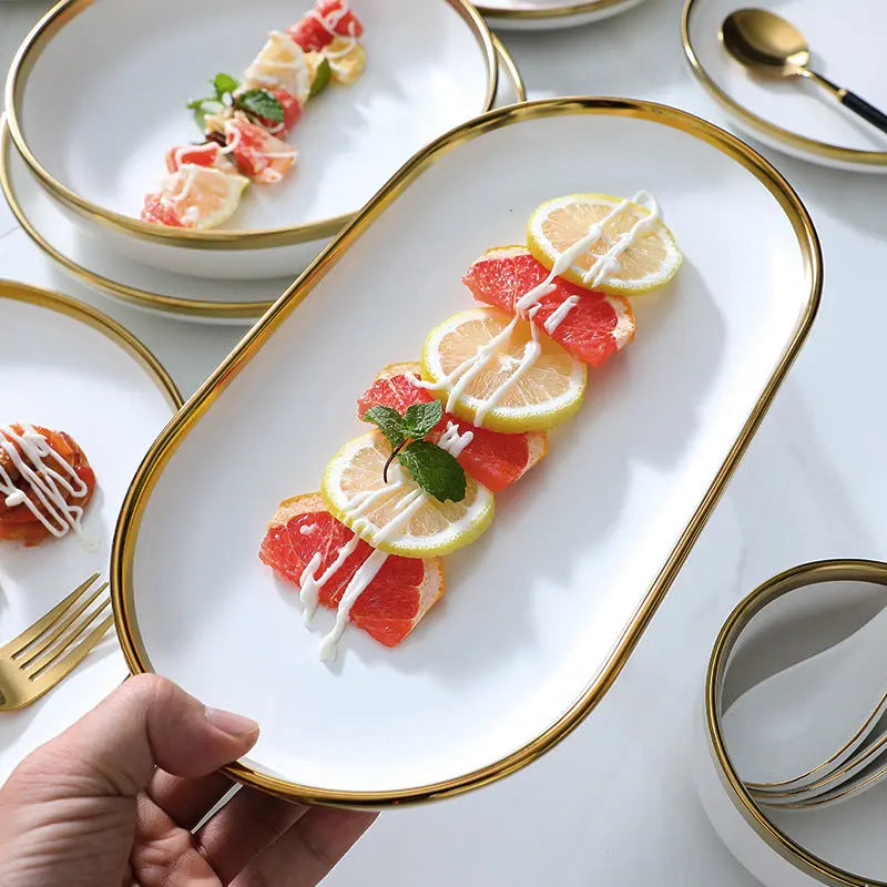 White Ceramic Dinnerware Set with Gold Rims